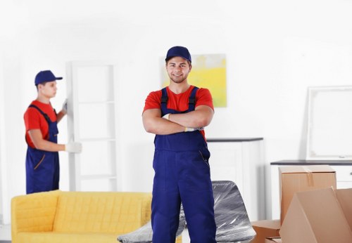 Furniture and IT equipment being prepared for office removals