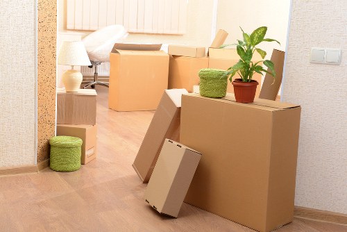 Packed boxes and furniture prepared for storage in Pimlico